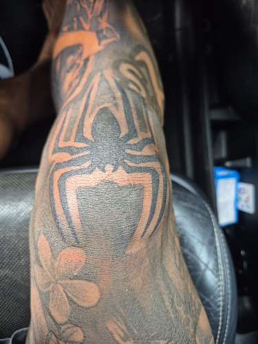Black Moon Collective Tattoo
